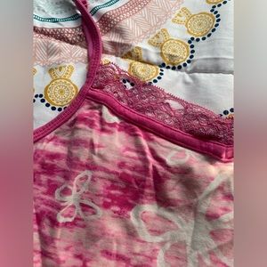 A rough medium, pink butterfly tank